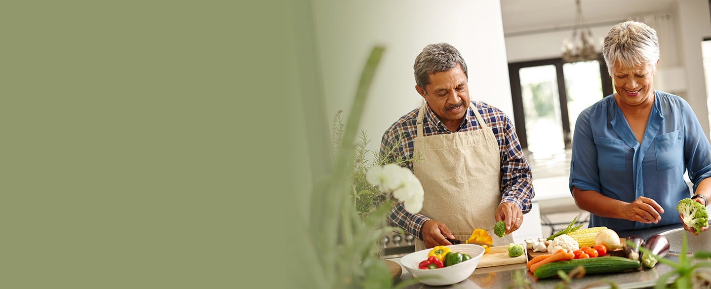 Couple cooking a healthy meal together.