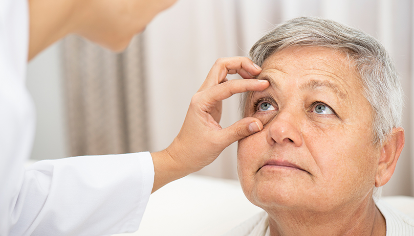 Woman getting an eye exam.
