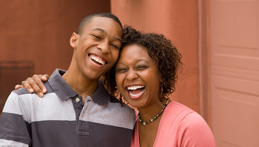 Mom and son laughing