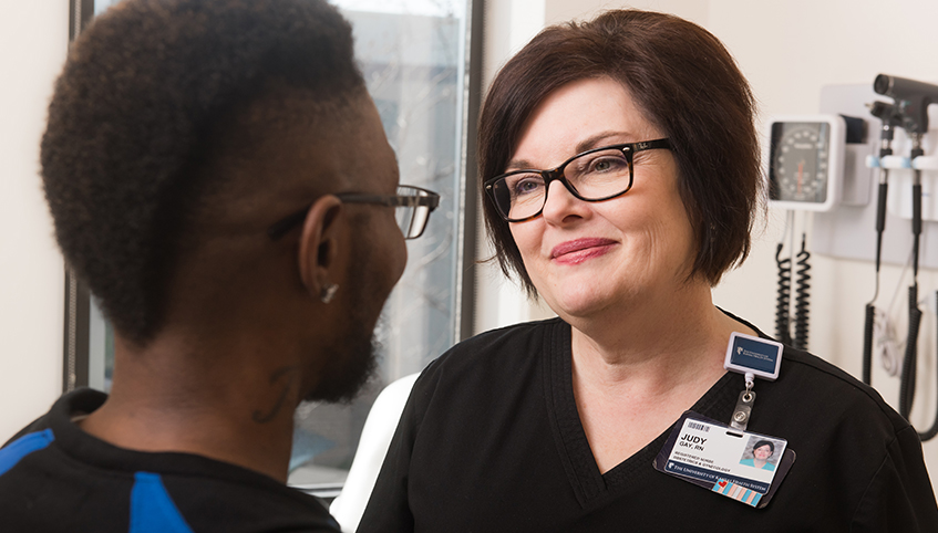 Nurse Judy Gay with transgender medicine patient Terrell Smith.