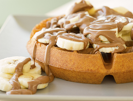 Waffle with bananas and peanut butter.