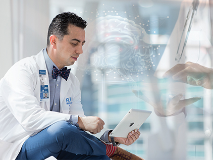 Doctor connecting with patient on iPad using telemedicine. 
