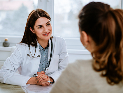 Doctor meeting with patient.