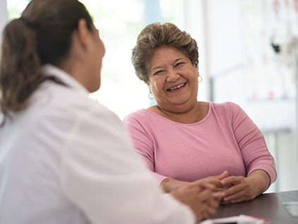 Patient visiting with doctor.