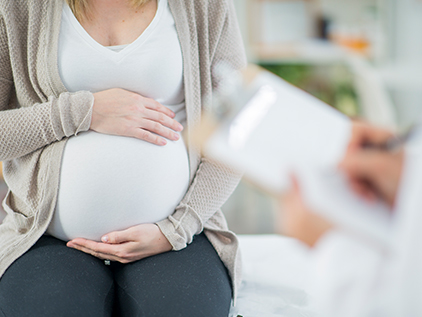 Pregnant woman at doctor