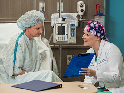 Cancer doctor and patient