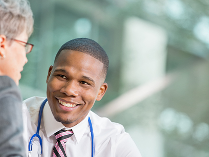 Doctor speaking with patient