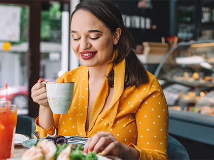 Happy woman in cafe