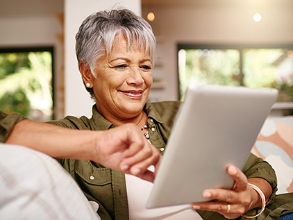 Woman using iPad.