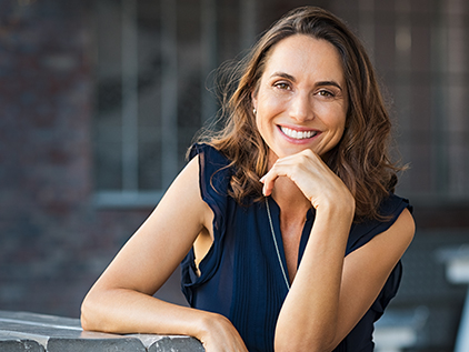 Woman outside smiling