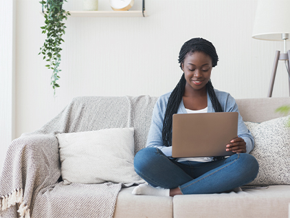 Virtual patient sitting on couch participating in telehealth video visit service