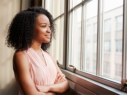 Woman looking out of the window