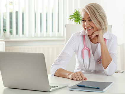 University of Kansas Health System physician conducting telehealth video visit with patient