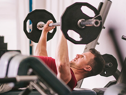 Man lifting weights. 