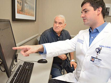Heart patient Charlie Chatman with Dr. Sauer.