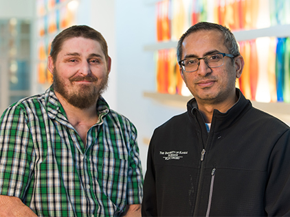 Burn and wound patient Justin Taylor with Dr. Bhavsar.