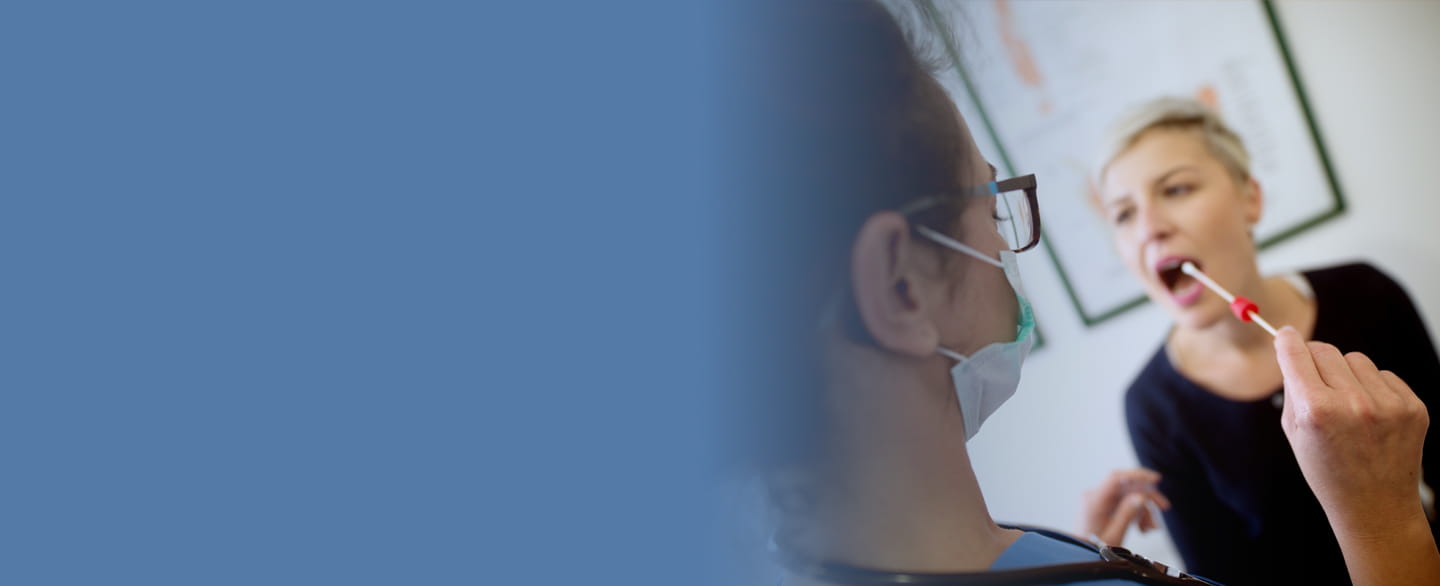 woman getting a cheek swab