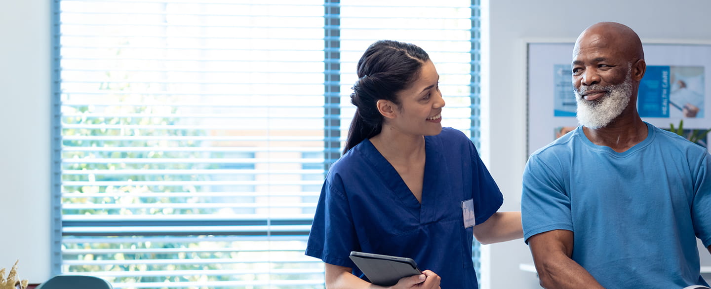 Nurse speaking with patient