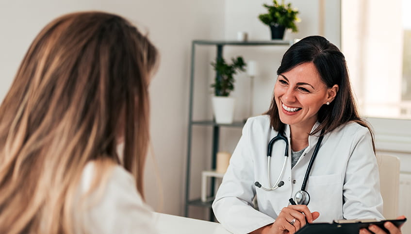 Doctor speaking with patient