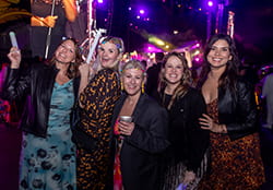group of women smiling at camera