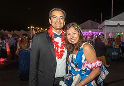 man and woman smiling at camera