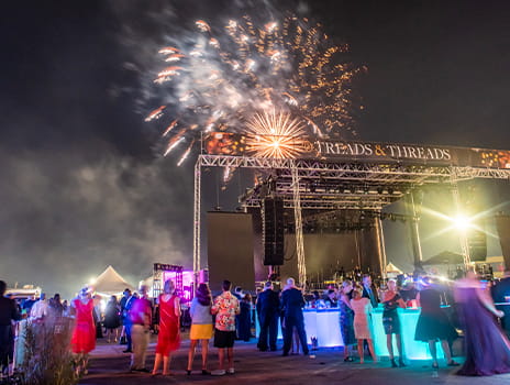 People watching firework display at Treads and Threads