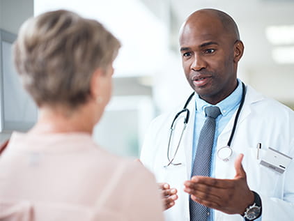 Doctor talking with patient