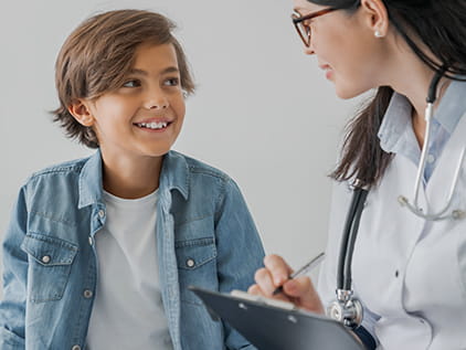 Doctor talking with a child