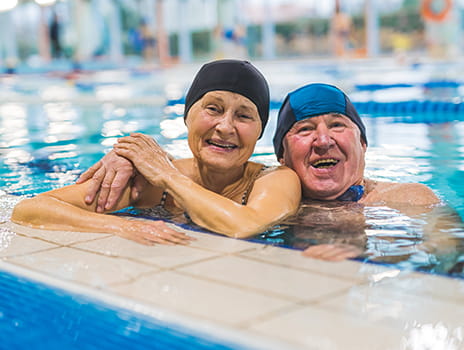 Smiling couple in a pool