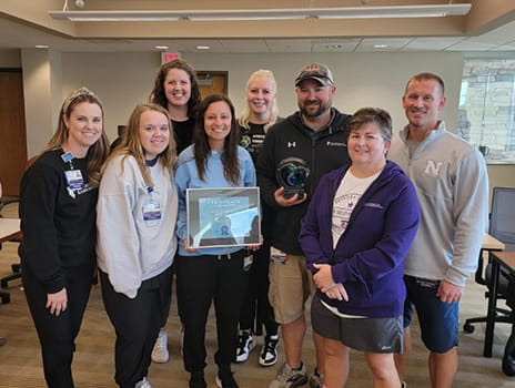 Athletic trainers winning an award