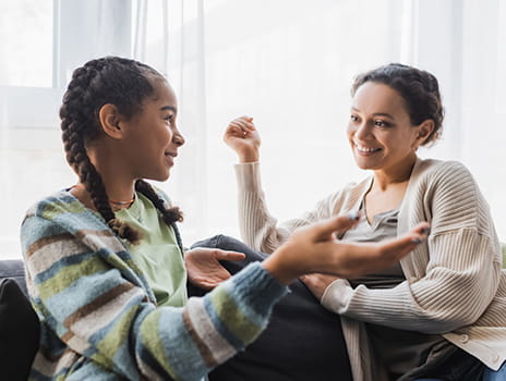 Mother and daughter talking