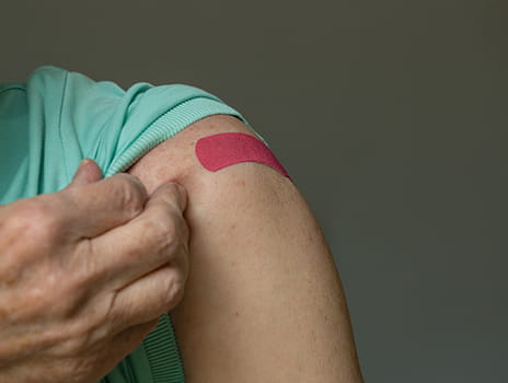 Bandaid on arm after flu shot