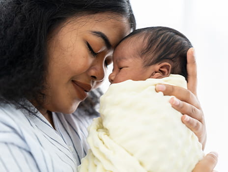 Mother with newborn baby