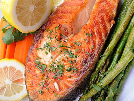Baked salmon with vegetables.