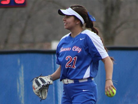 McKenna Lester playing softball