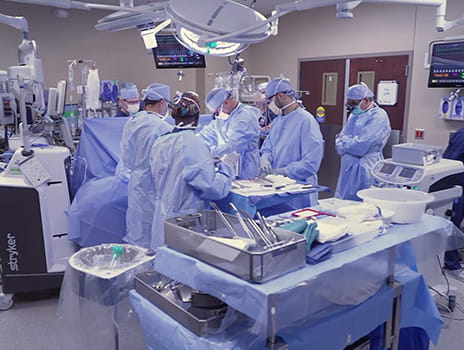 surgeons inside of an operating room