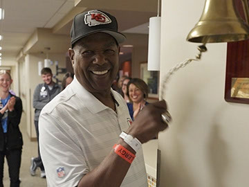 Ralph King ringing the bell