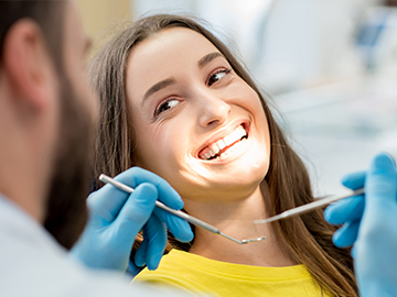 Dentist examining a patient
