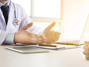 Doctor speaking with a patient