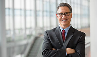 Business man smiling.