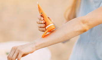 Applying sunscreen
