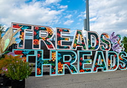 Treads and Threads sign