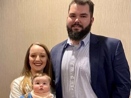 Jensen Springer with his wife and baby daughter