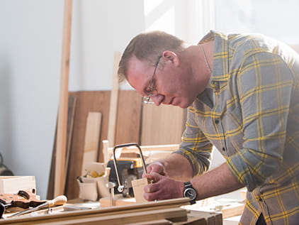 Heart patient Steve Herndon in his workshop.