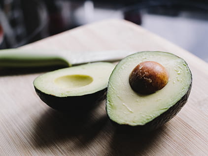 Avocado sliced in half.