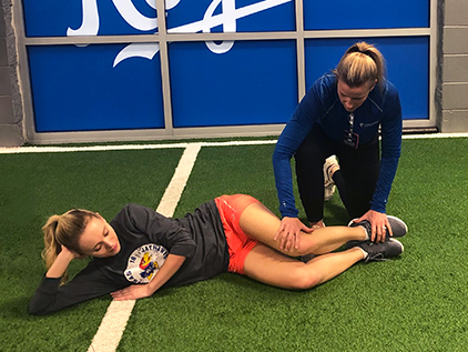 Krista Logan participating in an ACL injury reduction class.
