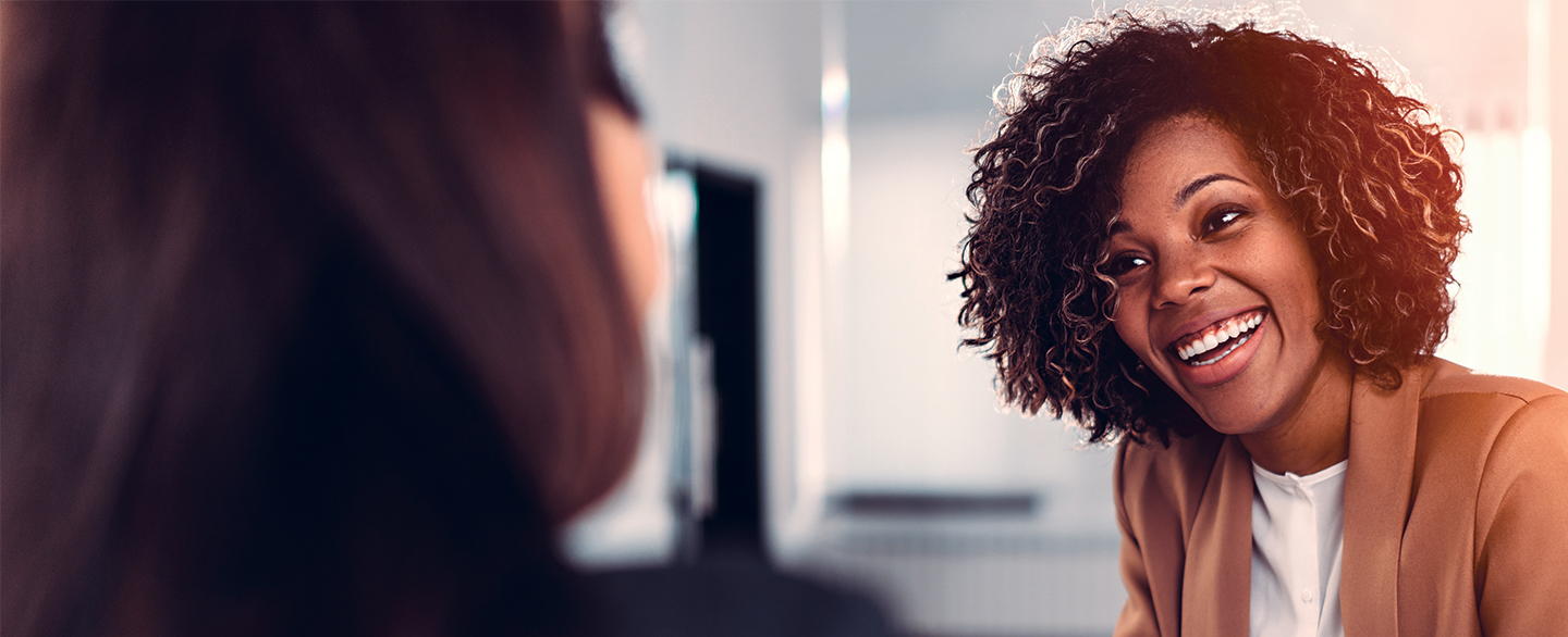 Happy woman in office setting