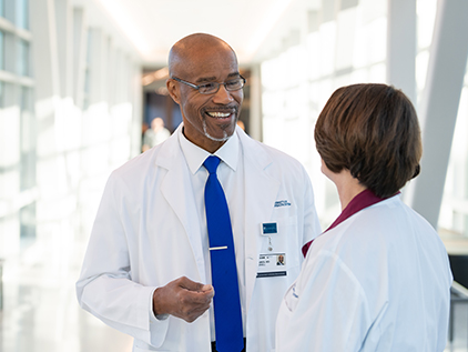 Two doctors talking.